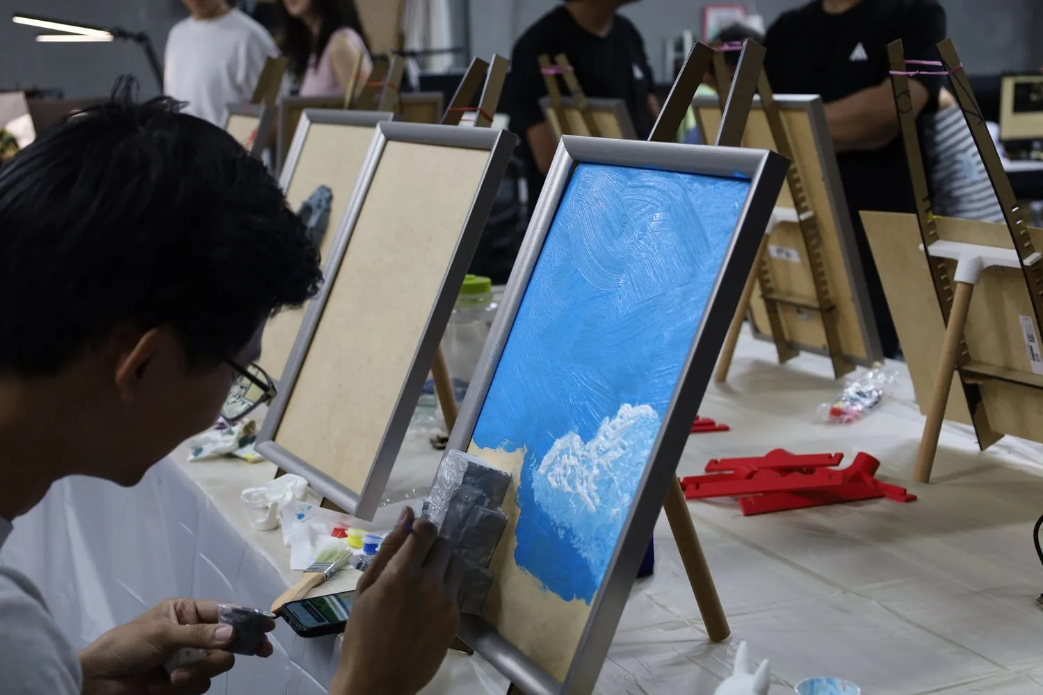 A team at a ColorVerse art jamming workshop